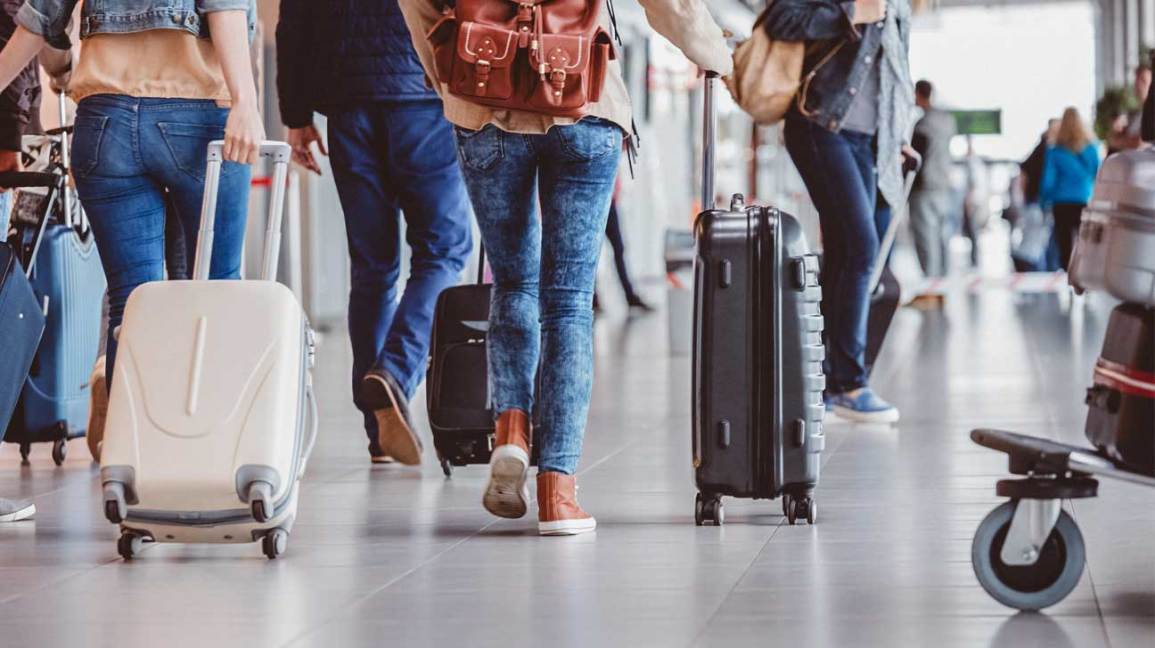 People travelling with luggage